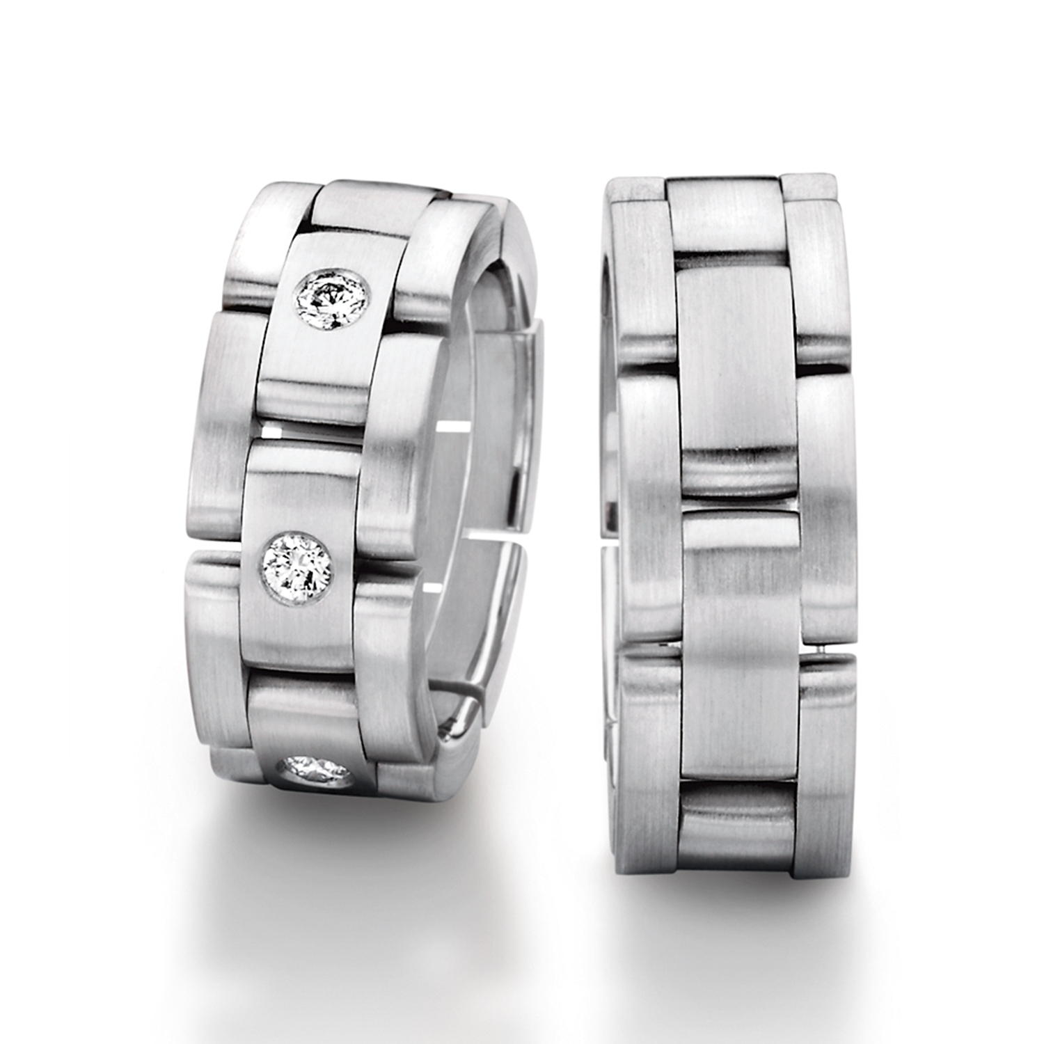 Chain rings in gold, platinum and palladium with diamonds Furrer Jacot