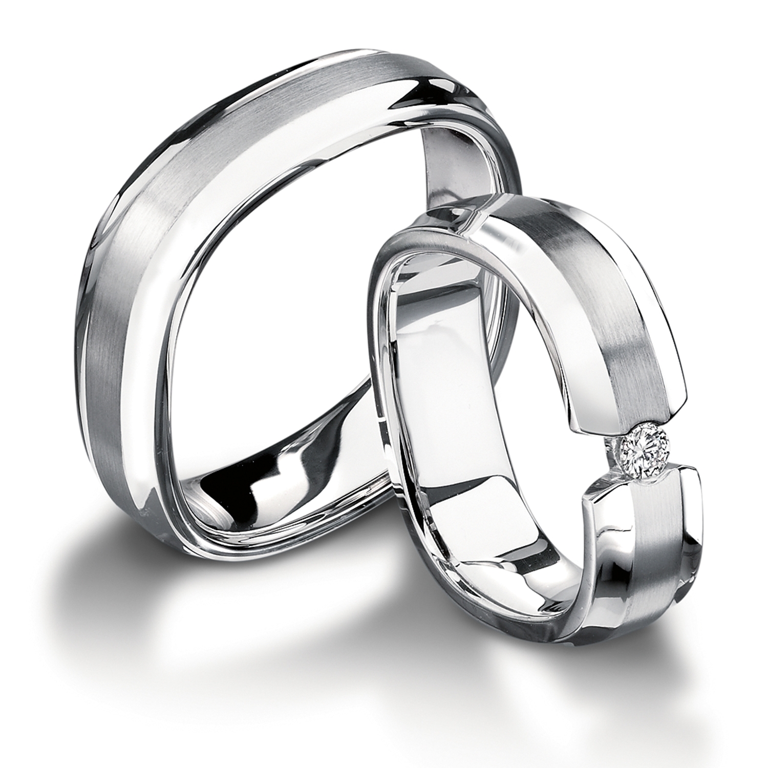 Rings in gold, platinum and palladium with diamonds Furrer Jacot