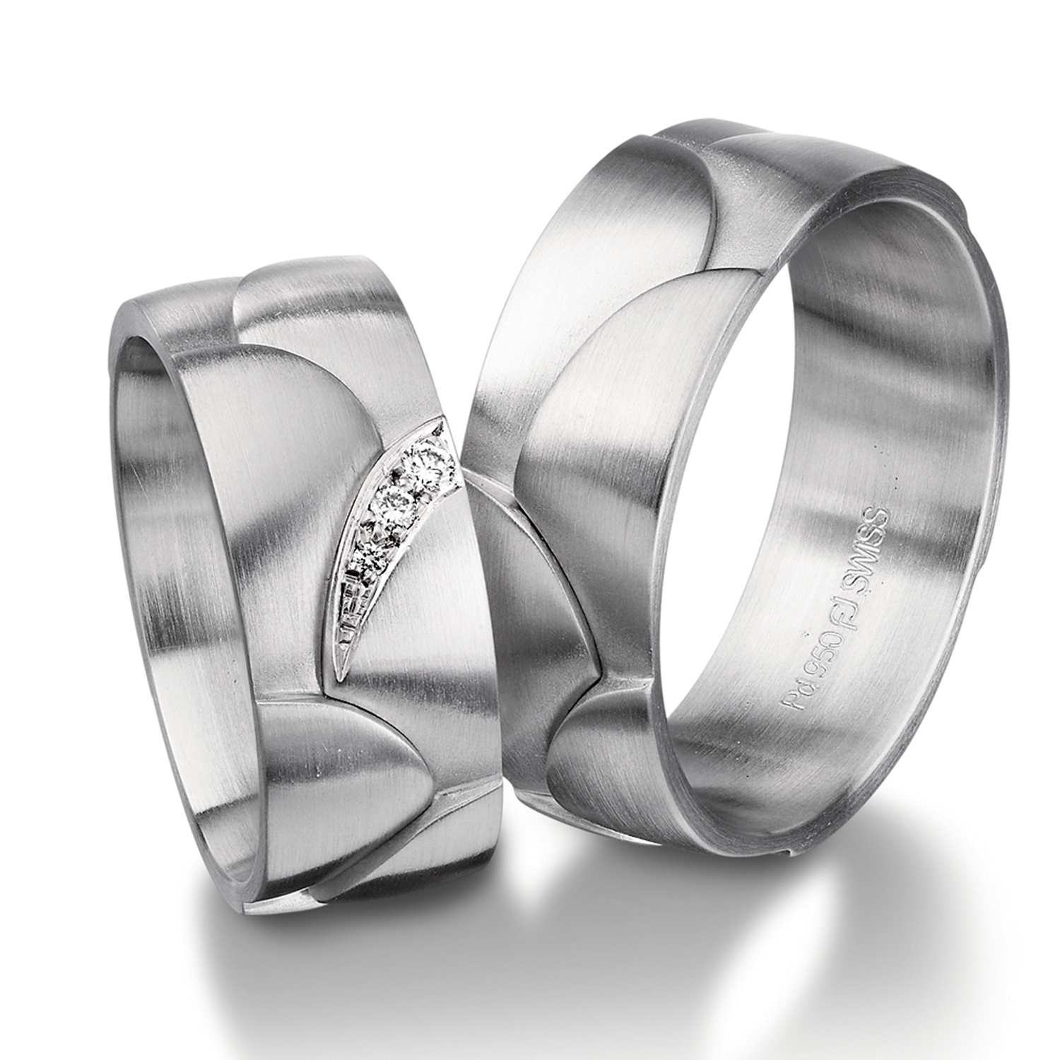 Rings in gold, platinum and palladium with diamonds Furrer Jacot