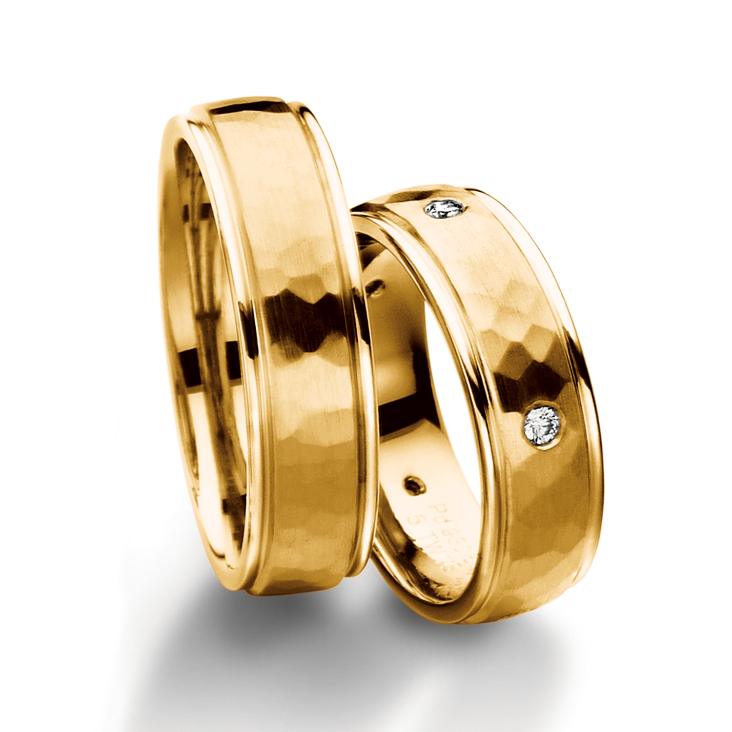 Rings in gold, platinum and palladium with diamonds Furrer Jacot