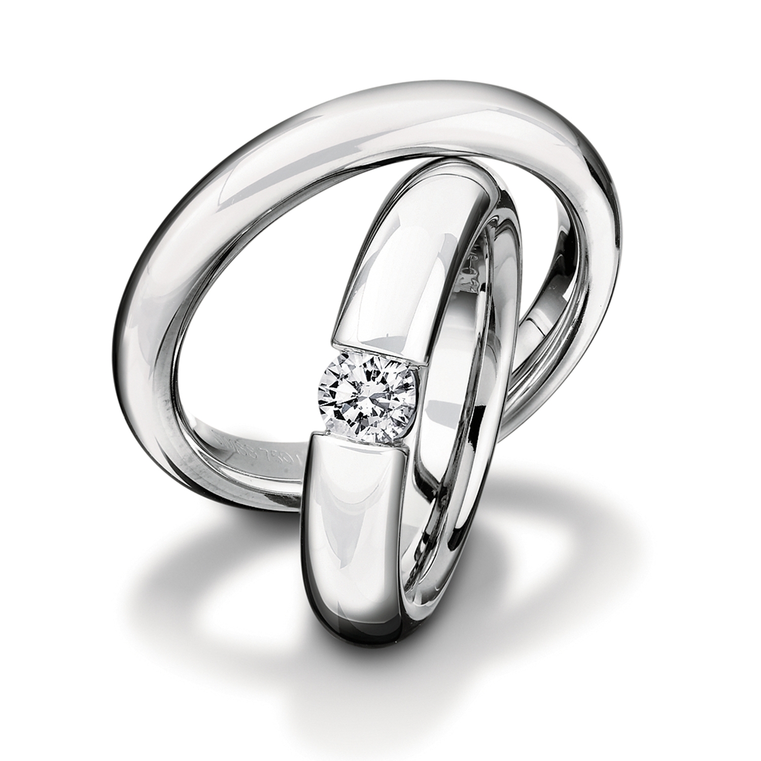 Rings in gold, platinum and palladium with diamonds Furrer Jacot