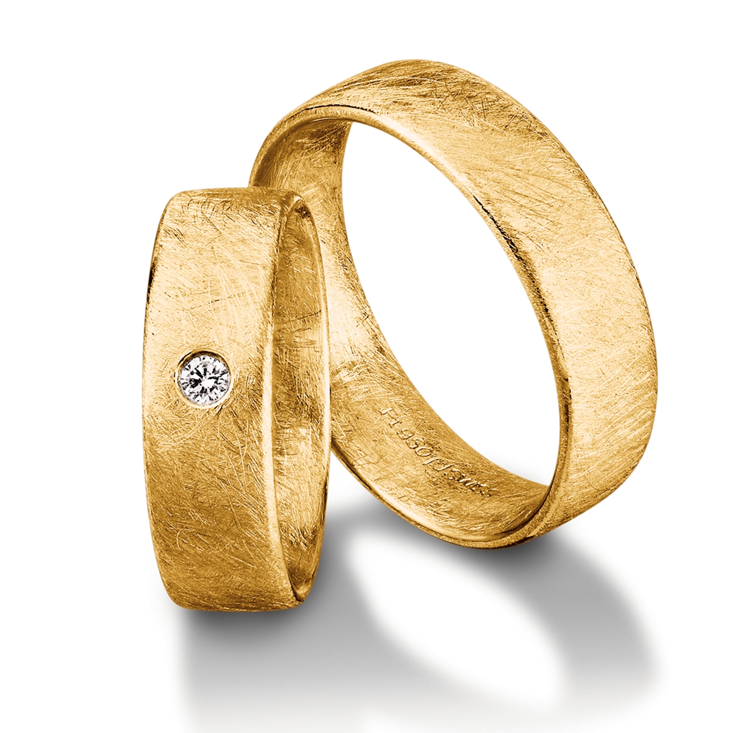 rings in gold, platinum, palladium and carbon with diamonds