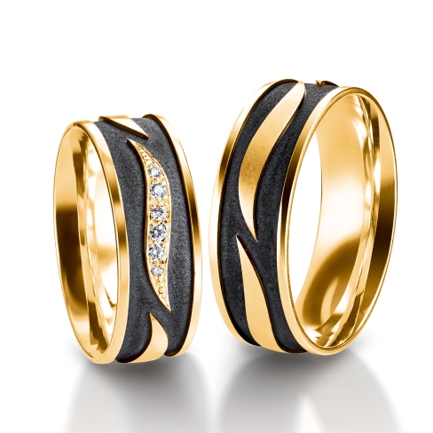 Rings in gold, platinum, palladium and black with diamonds Furrer Jacot